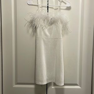 White mini dress with feather details